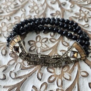 Elegant Black and Gold Beaded Bracelet Signed Heidi Daus